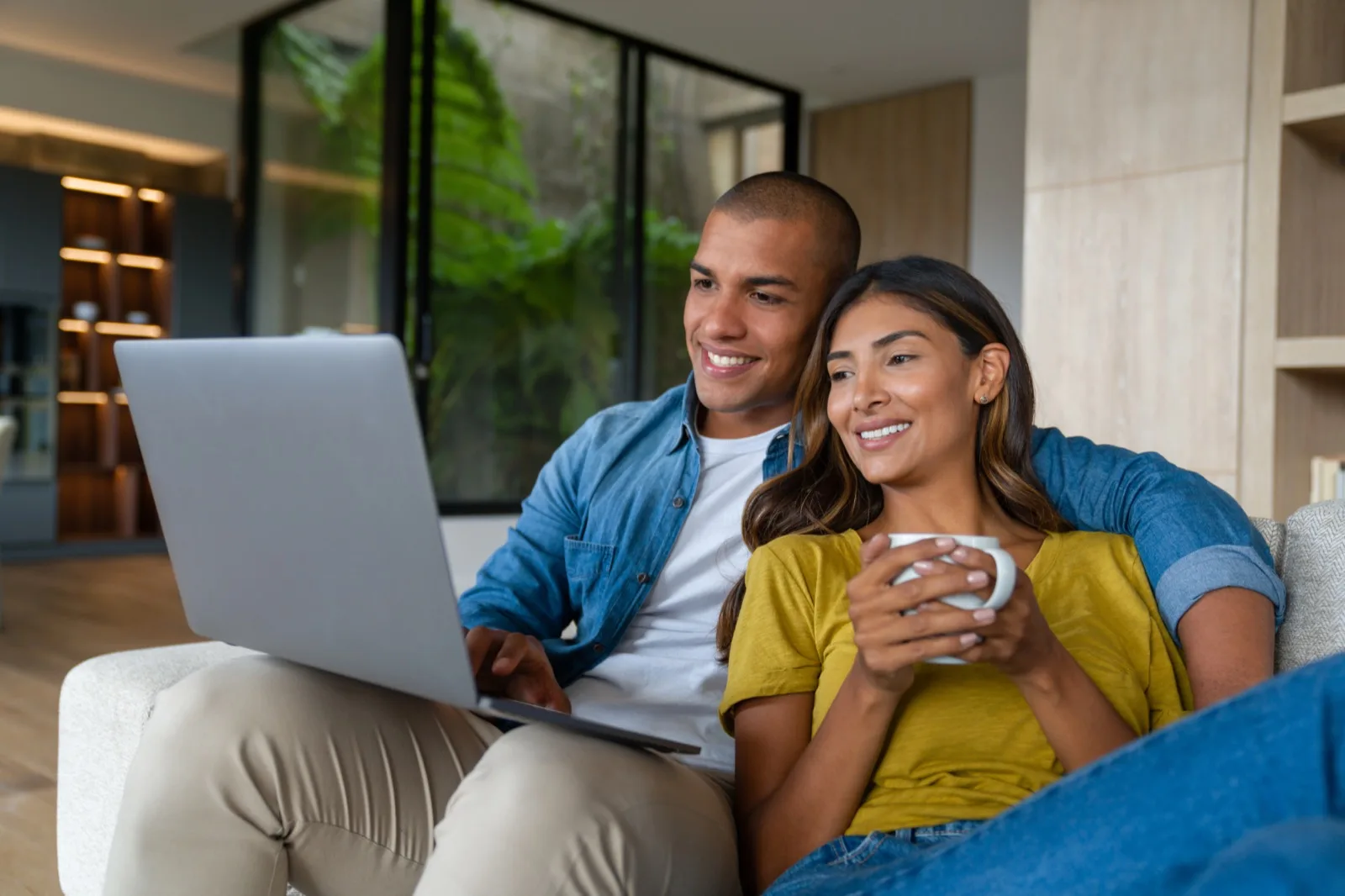 Home sellers at home reading their cash offer